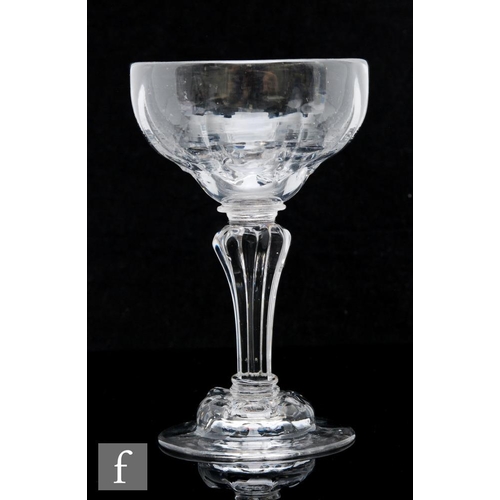 121 - An 18th Century sweetmeat glass circa 1745, the ovoid bowl with rib moulding with crown ends, above ... 