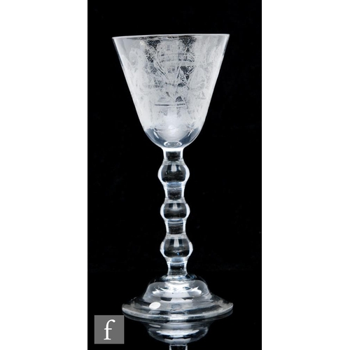 250 - An 18th Century Newcastle light baluster drinking glass circa 1750, possibly a marriage goblet, the ... 