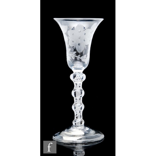 202 - An 18th Century wine glass circa 1765, the bell bowl decorated with engraved Jacobite style rose and... 