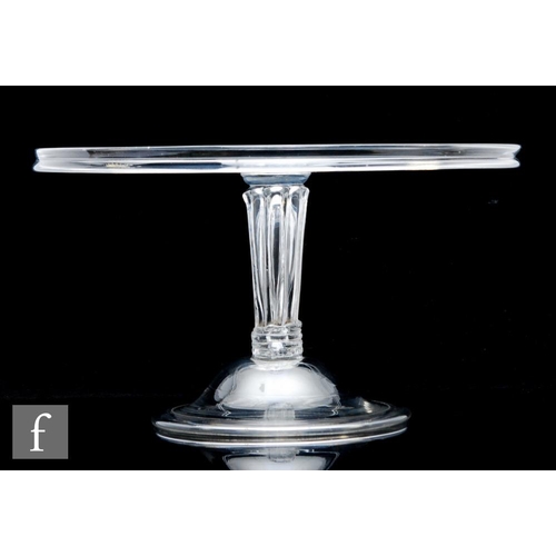 300 - An 18th Century clear crystal glass tazza circa 1760, with a wide circular top with collar rim, abov... 