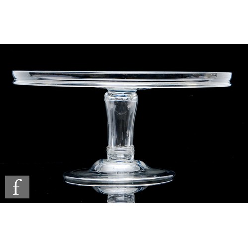 299 - An 18th Century large clear crystal glass tazza circa 1760, with a wide circular top with collar rim... 