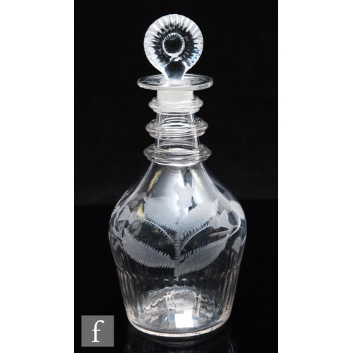 329 - A late Georgian Irish decanter of Prussian form with a band of basal moulding with triple annulated ... 