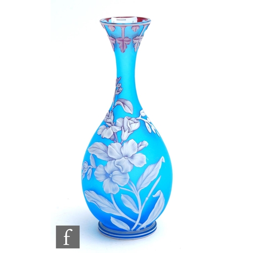 473 - A late 19th Century Thomas Webb & Sons cameo glass vase of footed bottle form with a slender dra... 