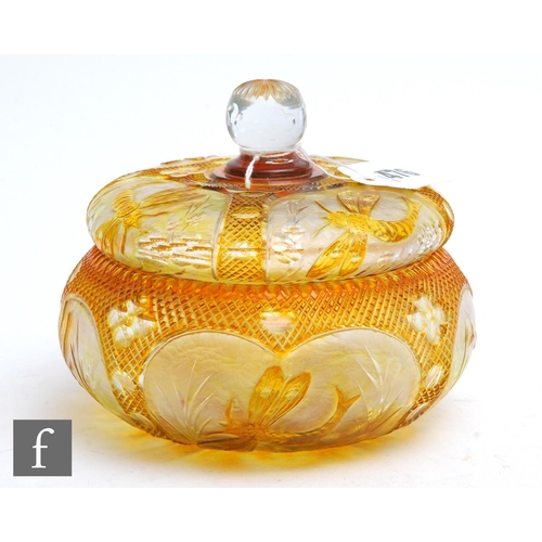 476 - A large late 19th Century Stevens & Williams powder bowl and cover, cased in deep golden amber o... 