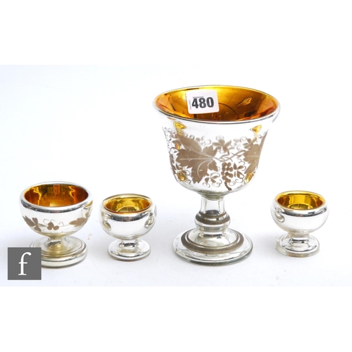 480 - A pair of 19th Century Hale Thomson Varnish glass pedestal salt bowls with silvered interior and gil... 