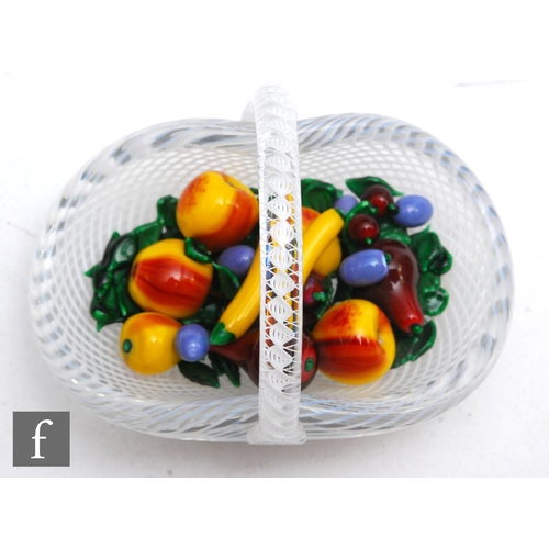 793 - A later 20th Century Saint Louis Abondance glass paperweight, modelled as a stylised fruit basket wi... 