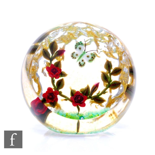 785 - A William Manson large Crimson Rose Spray glass paperweight, internally decorated with a green and w... 