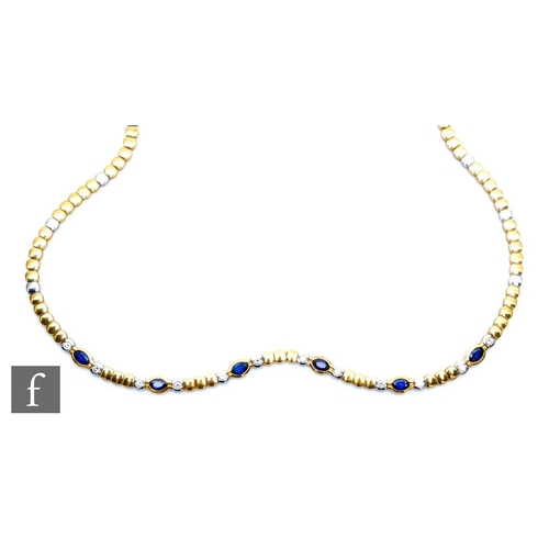 2 - An 18ct yellow and white gold necklet detailed with six oval collar set sapphires each flanked with ... 