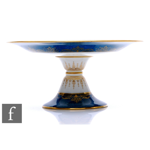 8 - A Royal Worcester Fallen Fruits hand painted comport decorated by Sebright with peaches, white grape... 