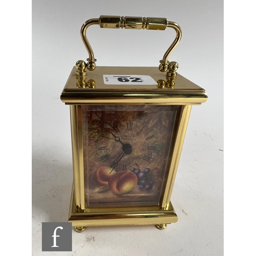 62 - A Kingsley Enamels Fallen Fruits carriage clock decorated to each face with hand painted fruits and ... 