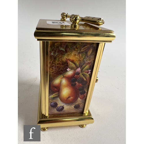 62 - A Kingsley Enamels Fallen Fruits carriage clock decorated to each face with hand painted fruits and ... 