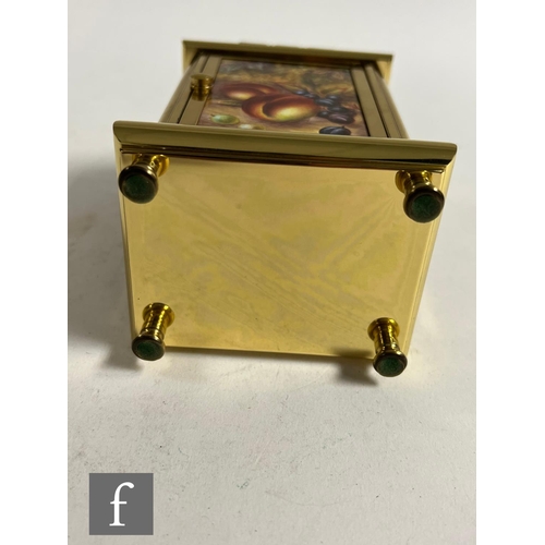 62 - A Kingsley Enamels Fallen Fruits carriage clock decorated to each face with hand painted fruits and ... 