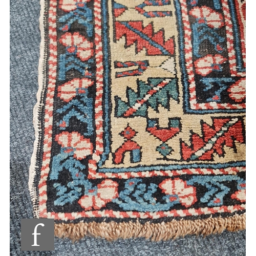 1279 - A Shirvan flat woven rug of deep blue, rust and oatmeal ground colours, with triple medallions to th... 