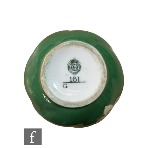 13 - A small Royal Worcester shape G161 ovoid vase decorated with a hand painted cartouche by Sebright wi... 