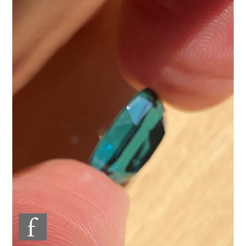 102 - A loose cut and polished oval mixed cut natural indicolite tourmaline stone, length 13.82mm, width 9... 