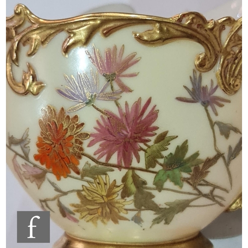 15 - A Royal Worcester shape 1471 Empress blush ivory teacup and saucer decorated with sprays of flowers ... 