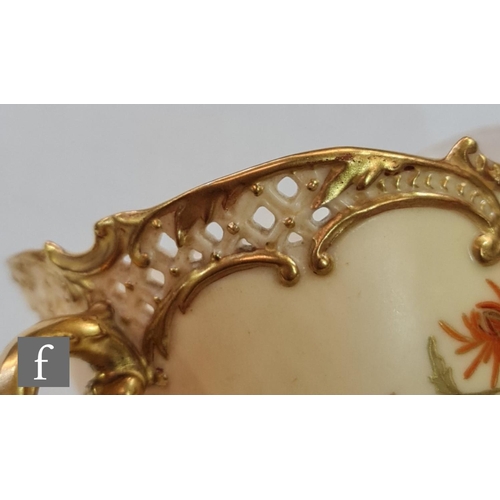 15 - A Royal Worcester shape 1471 Empress blush ivory teacup and saucer decorated with sprays of flowers ... 