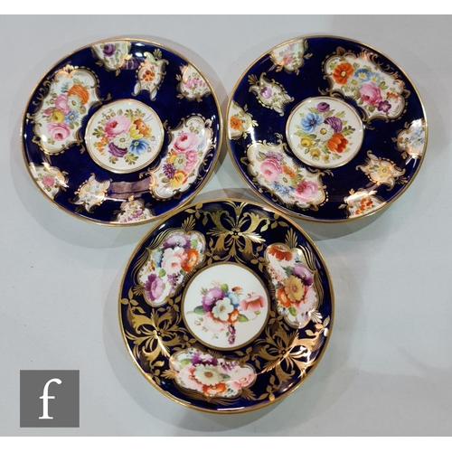 185 - A 19th Century shell shaped dish decorated to the centre with two stylised garden birds amidst a mou... 