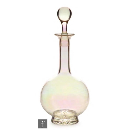 8017 - A post war Czechoslovakian glass decanter of globe and shaft form, raised to a star cut foot, all in... 