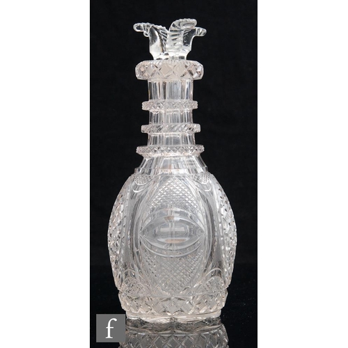 8029 - A Bohemian glass compartmental decanter, probably Harrachov, circa 1835, of Prussian form, the clear... 