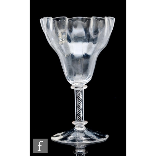 626 - A late 19th to early 20th Century Stourbridge clear crystal glass vase, the frill crown top above an... 