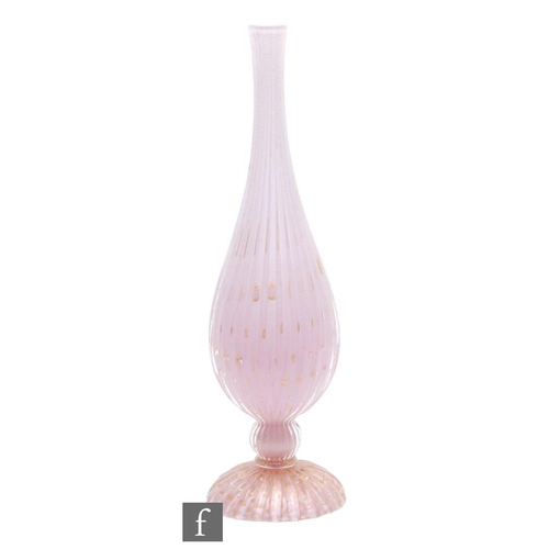 631 - A post war Italian Murano glass table lamp in the manner of Archimede Seguso, the fluted and domed b... 