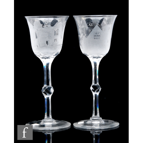 638 - A pair of early 20th Century oversized clear crystal glass goblets, the ovoid bowls with everted rim... 