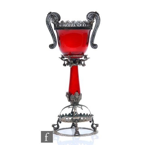 649 - A 19th Century Italian Venetian ruby glass chalice with an ovoid bowl and hollow blown stem, mounted... 