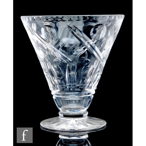 684 - A 1930s Art Deco clear cut crystal glass vase by Harbridge, the footed conical body cut with an abst... 