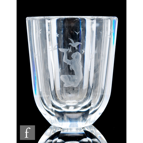 687 - A 1930s Art Deco clear crystal vase of hexagonal form with heavy cased wall, engraved with a kneelin... 