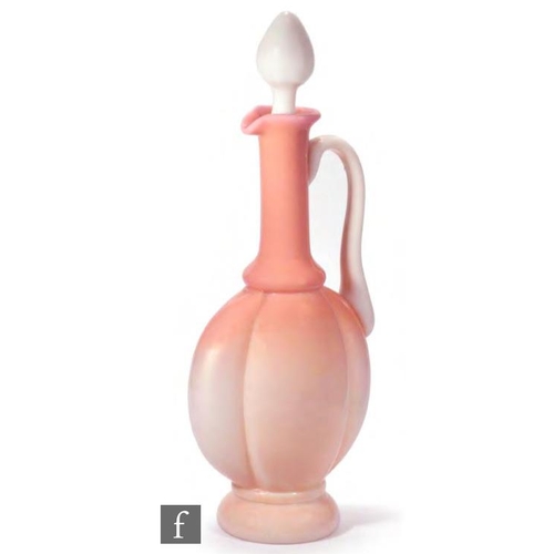 8035 - An early 20th Century continental decanter, of footed compressed and lobed form with tall collar nec... 