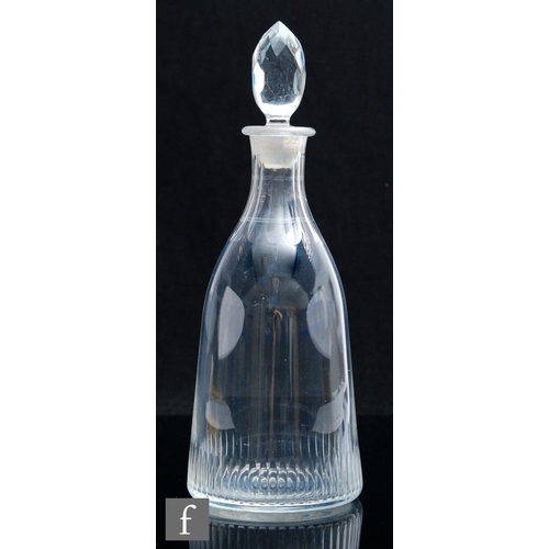 8060 - An early 19th Century French glass decanter, circa 1810-1820, of taper form with flat cut flutes to ... 