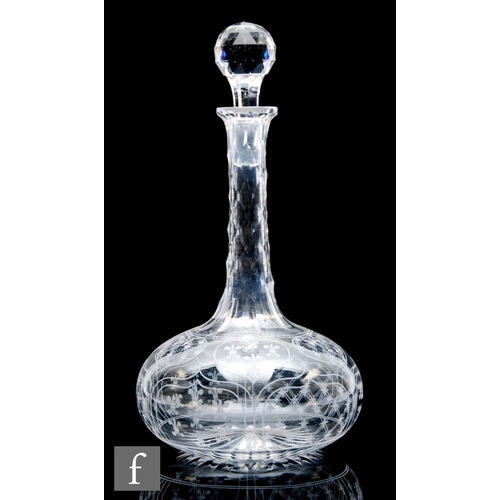 8071 - A late 19th Century glass decanter, circa 1870, of compressed globe and shaft form, the diamond face... 
