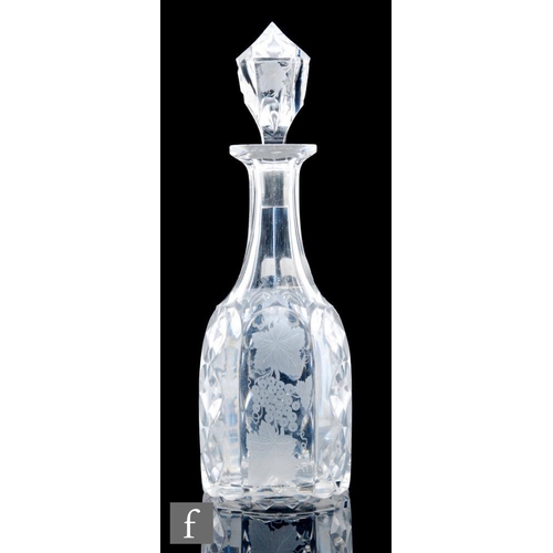 8105 - A 19th Century glass bludgeon decanter, circa 1855-80, the body cut with arched panels engraved with... 
