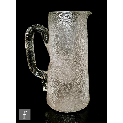 8129 - A later 19th Century continental champagne jug of tapered cylinder form, with integral spout and hig... 