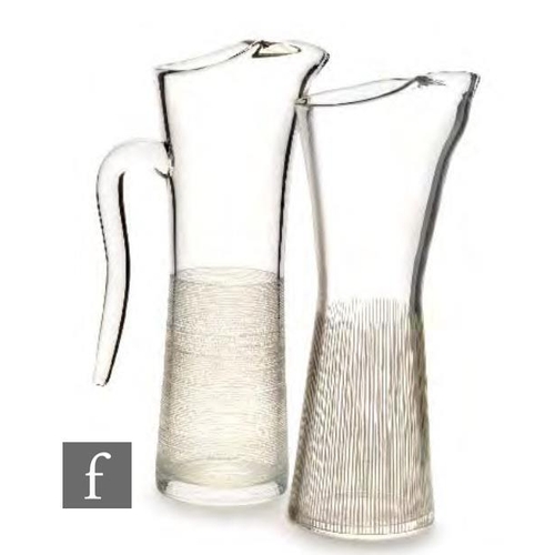 8007 - A pair of 1950s Swedish Johanfors glass pitchers from Bengt Orupt's Strict series, each of slender w... 