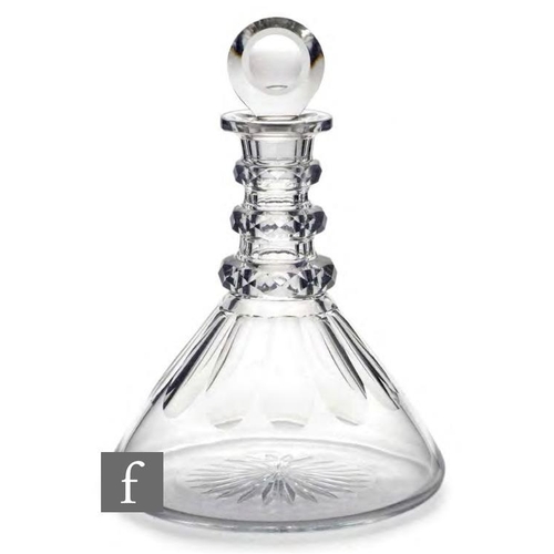 8040 - A 1920s glass ships decanter in the Regency style, the fluted neck with three applied and faceted ri... 