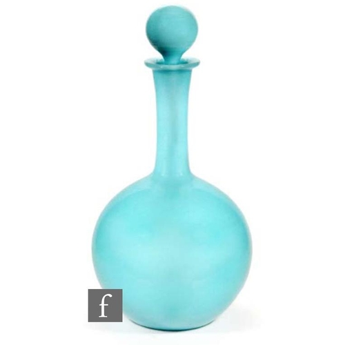 8042 - A French glass decanter, circa 1930s, of globe and shaft form, in opaque pale blue, with conforming ... 