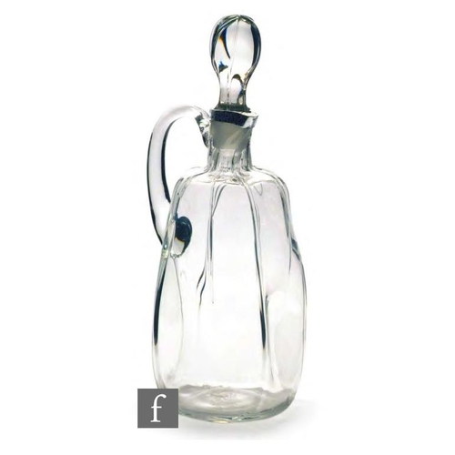 8043 - An early 20th Century Arts and Crafts hallmarked silver and glass decanter, of leather bag form, the... 