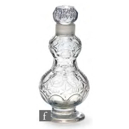 8057 - An 18th Century German glass decanter of double gourd form, circa 1750, cut with arcs, notches, star... 