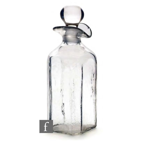8073 - An early 19th Century two part moulded square section spirit decanter with a ball stopper, English c... 