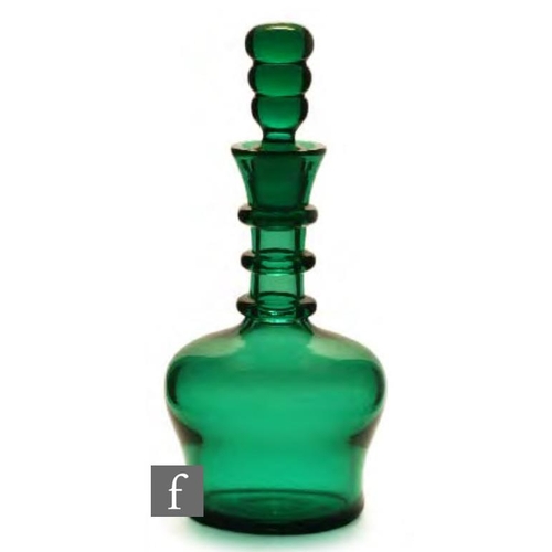 8078 - A 1930s Frederick Carder for Steuben green glass decanter in Pomona green with three applied neck-ri... 