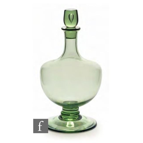 8085 - A sherry decanter circa 1940 in green, height 25cm.