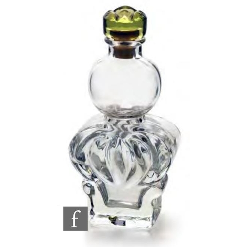 8125 - A 1960s sculptural crystal decanter fitted with a green cork fitted disc, the upper body a plain glo... 