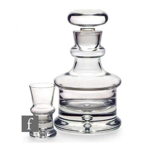 8142 - A thick walled contoured spirit decanter designed by Ravenscroft, an open air bubble to the base sec... 