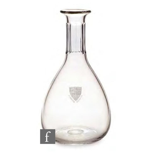 8158 - A 1920s glass carafe, of ovoid form with fluted neck, acid badged for Pembroke College, height 23.5c... 