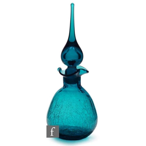 8166 - A post war American Blenko glass decanter, of ovoid form with triform rim, all in blue with a crackl... 