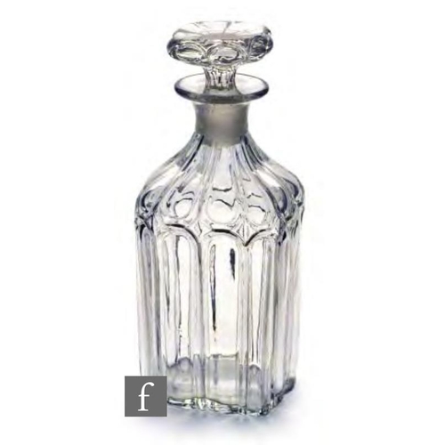 8171 - A 19th Century glass spirit decanter circa 1845, of three part moulded square section with canted co... 