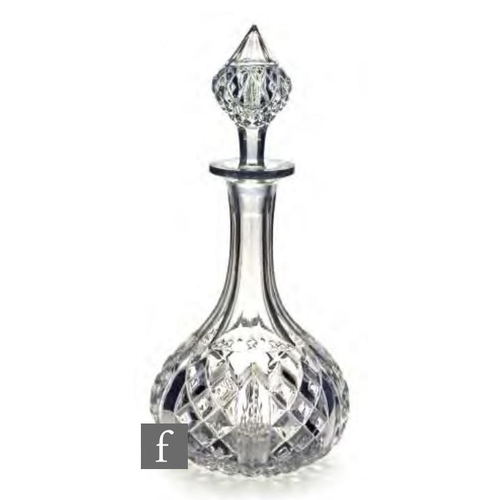 8174 - A late 19th Century glass decanter circa 1870, of globe and shaft form, pressed with diamonds below ... 