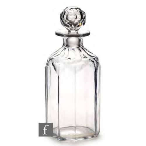 8187 - A 19th Century glass decanter circa 1840-1845, of square section with canted corners, the shoulders ... 